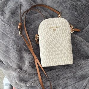 Michael Kors Monogram Cream and Tan Crossbody Bag. Only used a few times